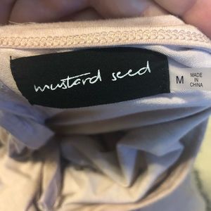 Blush pink T-shirt with ties in the back